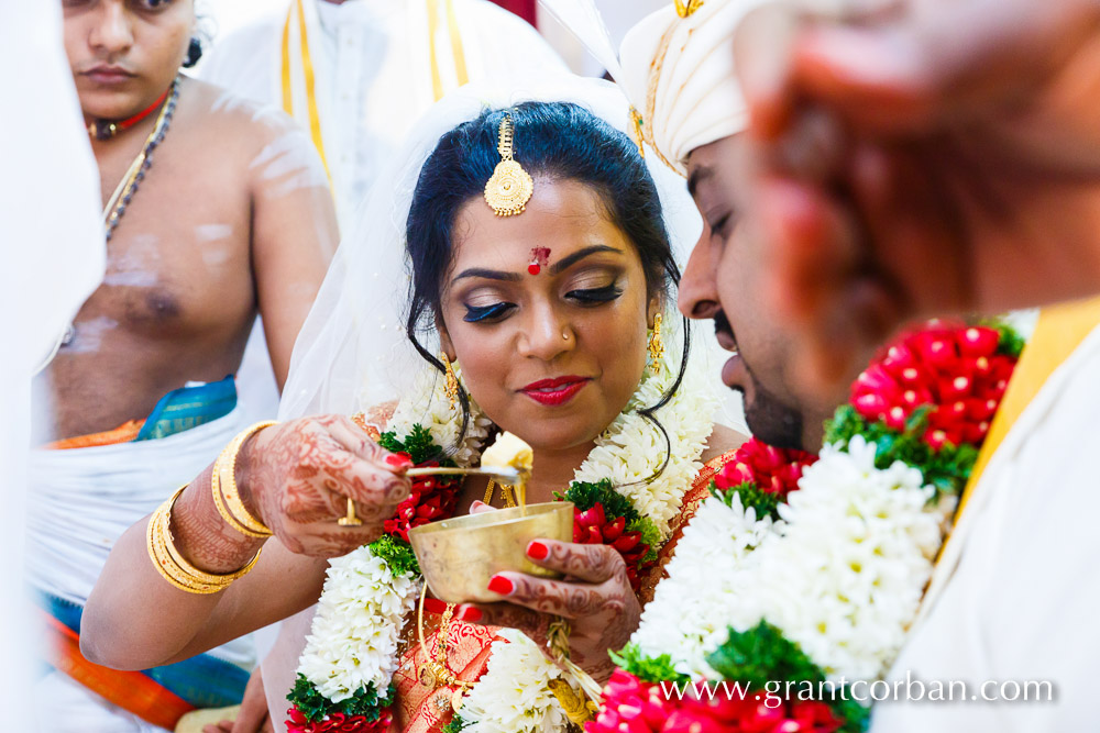 Sri Balathandayuthapani hindu temple wedding bride feeds groom