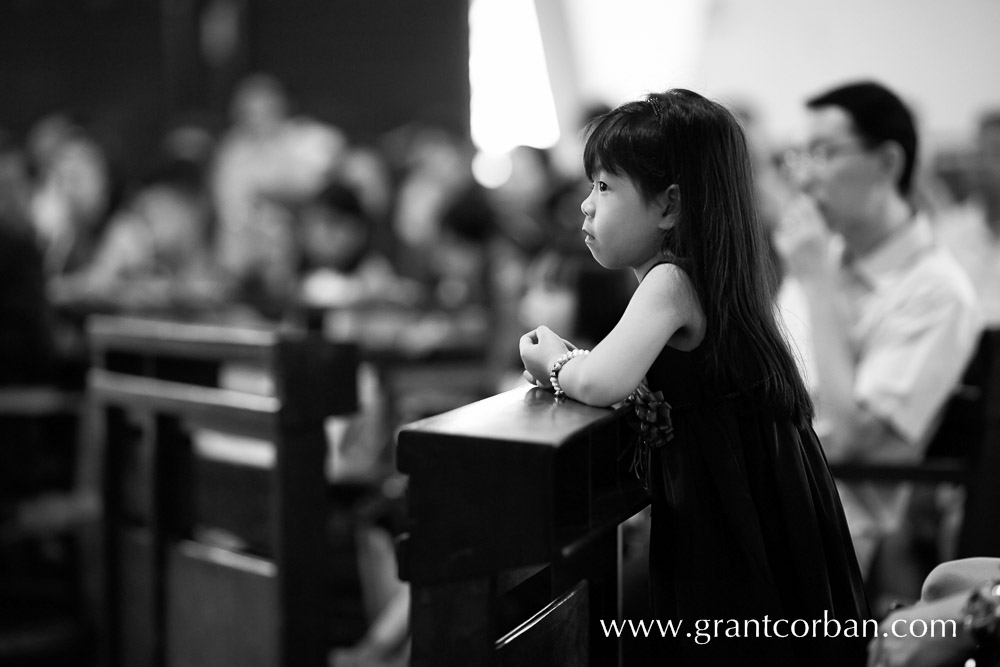 black and white wedding photo at Bride in car at wedding church of the holy spirit greenlane penang