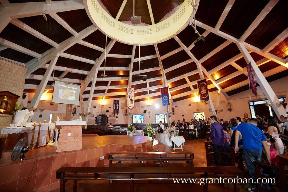 interior photo of Bride in car at wedding church of the holy spirit greenlane penang